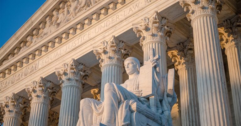 us supreme court statue and pillars GettyImages 1167833543 1200w 628h